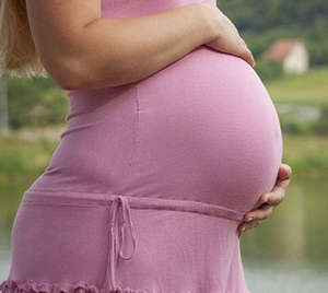 Круглая форма животапри беременности