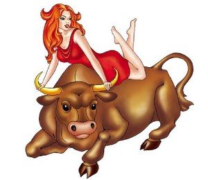 Девушка сидит на быке и держит его за рога
