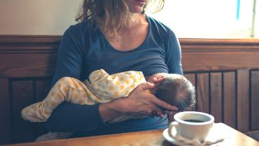 Mum breastfeeding baby in public