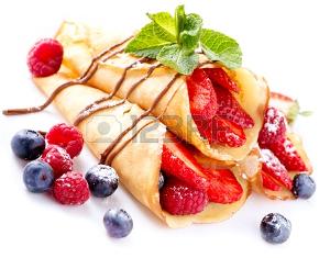 Crepes With Berries over White Фото со стока